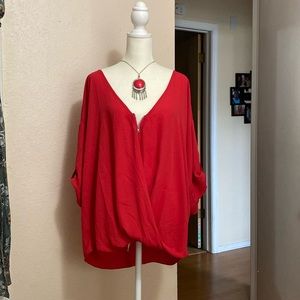 3/4 length, zipper neck line, high-low dressy top